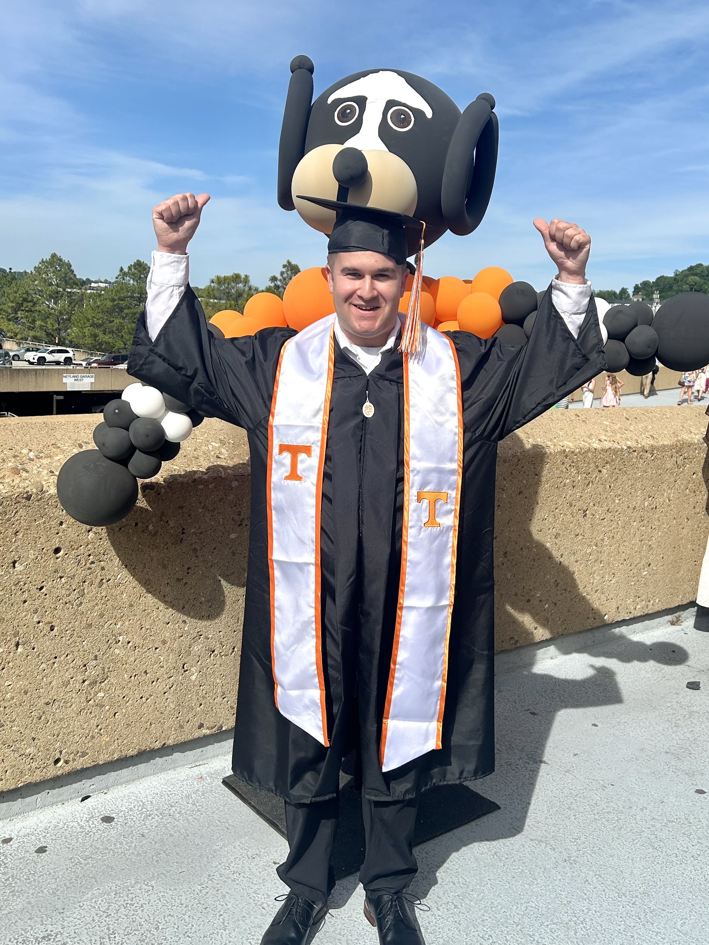 Ryan Wolpert in graduation robes at the University of Tennessee